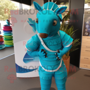 Turquoise Armadillo mascot costume character dressed with a Rash Guard and Cufflinks