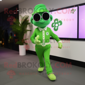 Lime Green Four Leaf Clover mascot costume character dressed with a Dress Pants and Digital watches