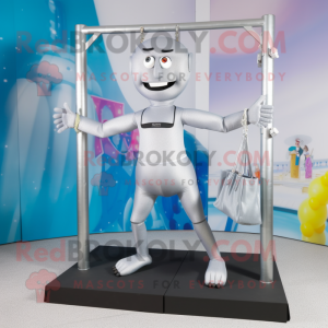 Silver Trapeze Artist mascot costume character dressed with a Leggings and Briefcases