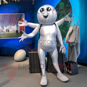 Silver Trapeze Artist mascot costume character dressed with a Leggings and Briefcases