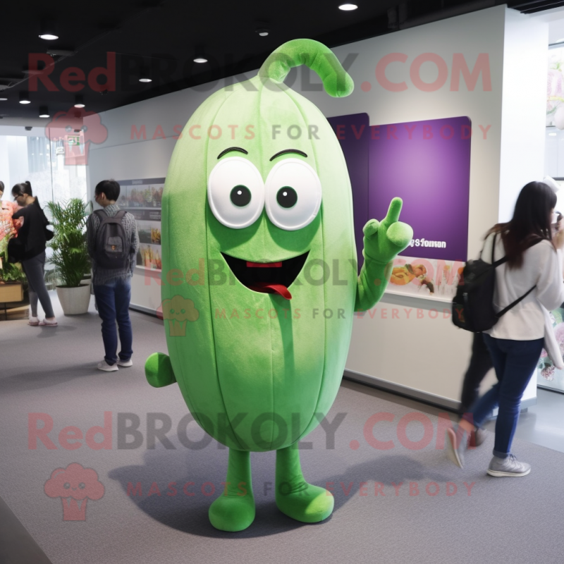 Green Eggplant mascot costume character dressed with a Skinny Jeans and Keychains