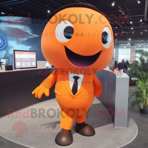 Orange Whale mascot costume character dressed with a Button-Up Shirt and Tie pins
