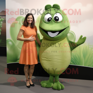 Olive Salmon mascot costume character dressed with a Sheath Dress and Watches