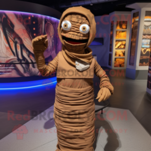 Brown Mummy mascot costume character dressed with a Jacket and Anklets