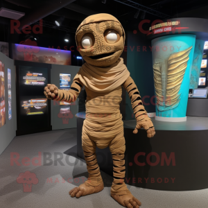 Brown Mummy mascot costume character dressed with a Jacket and Anklets