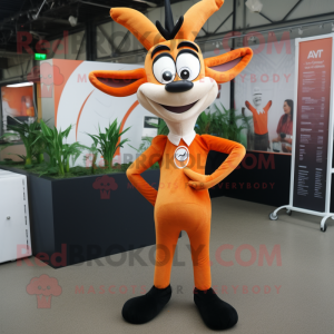 Orange Gazelle mascot costume character dressed with a Jeggings and Tie pins