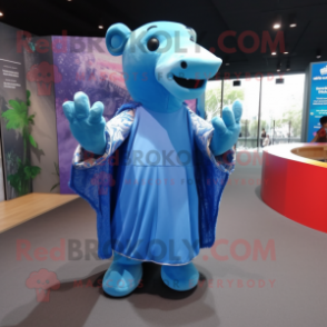 Blue Tapir mascot costume character dressed with a Cover-up and Hair clips