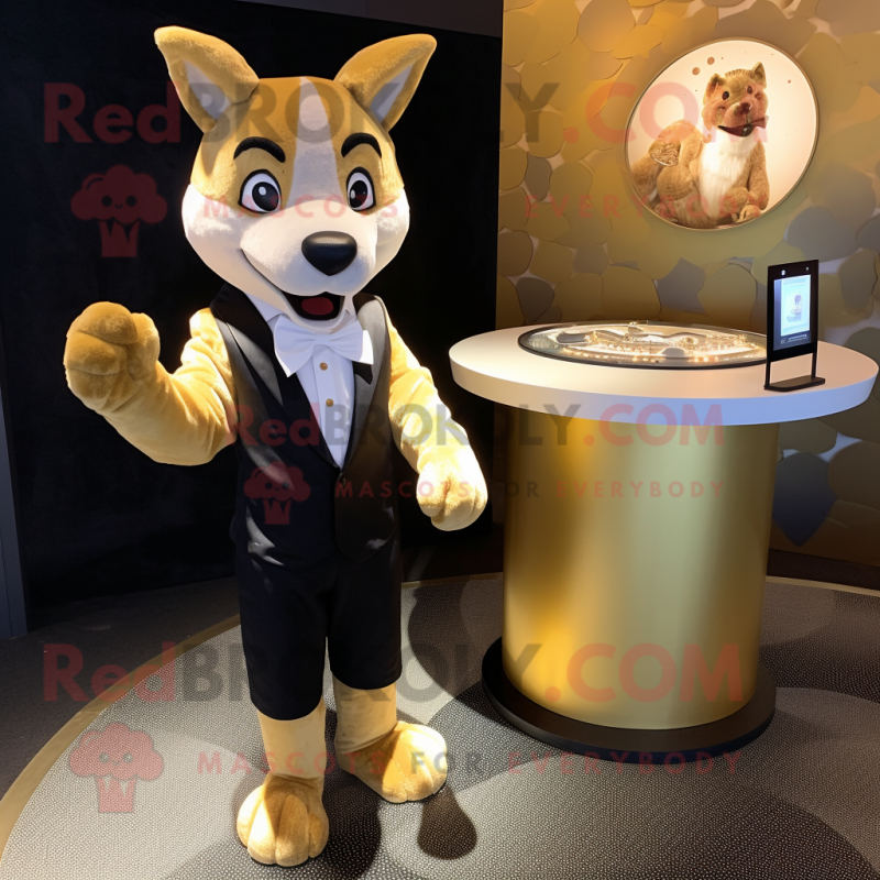 Gold Dingo mascot costume character dressed with a Tuxedo and Anklets