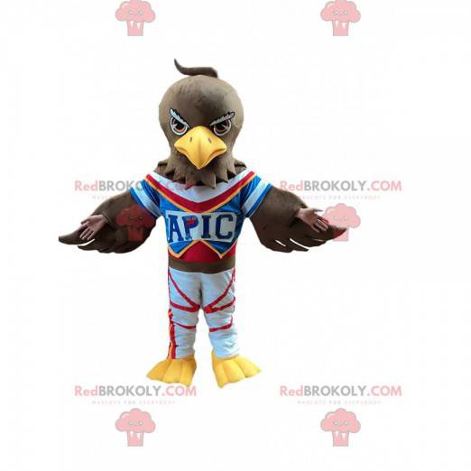 Brown eagle mascot in sportswear, vulture costume -