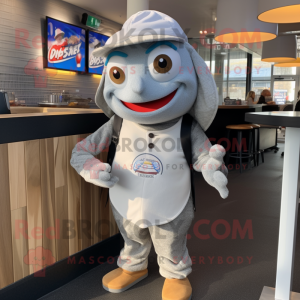 Silver Fish And Chips mascot costume character dressed with a Sweatshirt and Berets