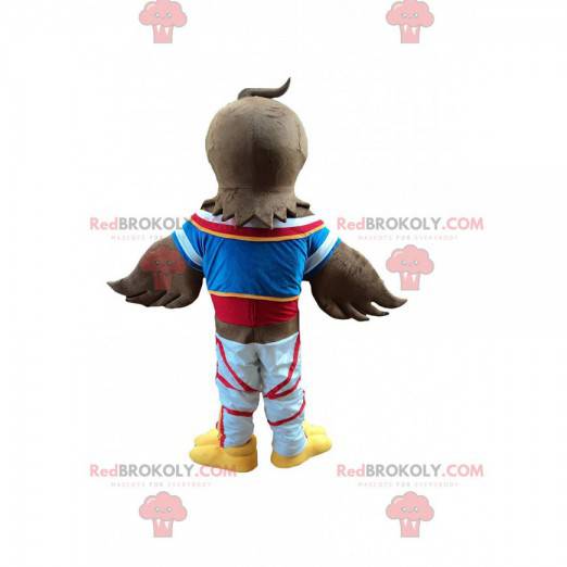 Brown eagle mascot in sportswear, vulture costume -