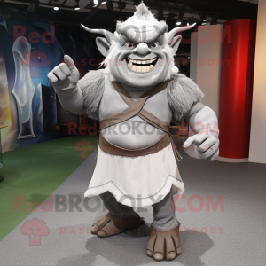 Silver Ogre mascot costume character dressed with a Sheath Dress and Backpacks