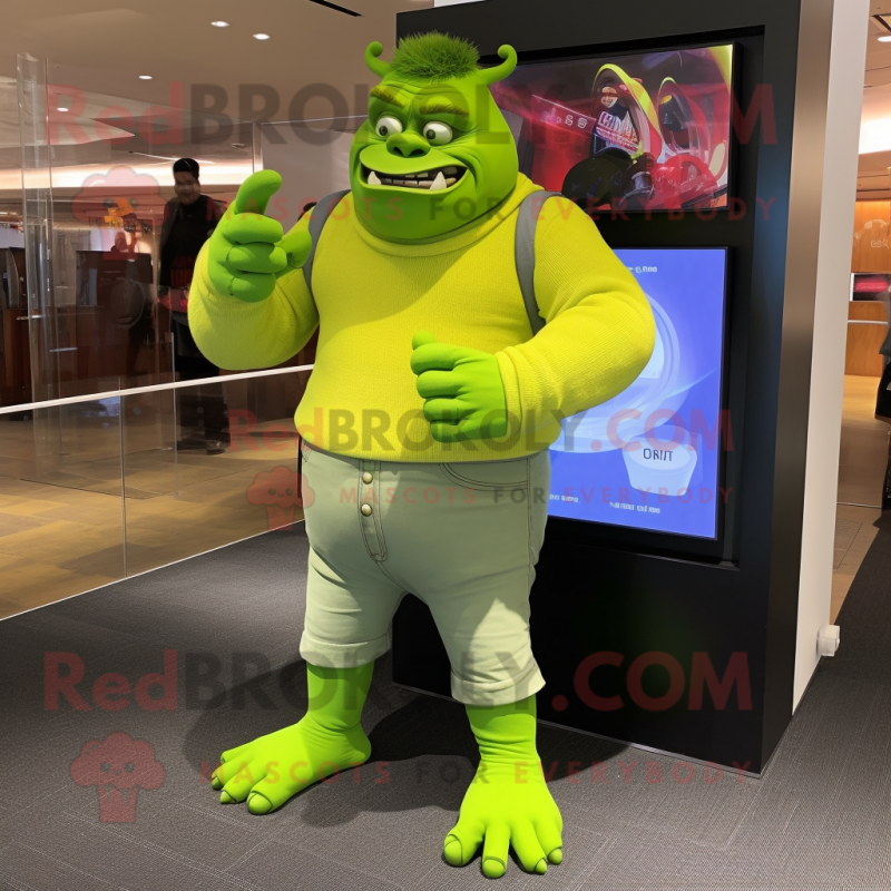 Lime Green Ogre mascot costume character dressed with a Skinny Jeans and Watches