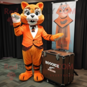 Orange Bobcat mascot costume character dressed with a Cover-up and Briefcases