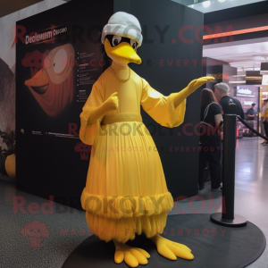 Gold Dodo Bird mascot costume character dressed with a Empire Waist Dress and Caps