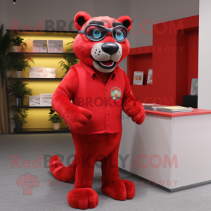 Red Panther mascot costume character dressed with a Waistcoat and Reading glasses