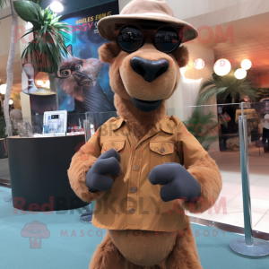 Brown Camel mascot costume character dressed with a Denim Shorts and Eyeglasses