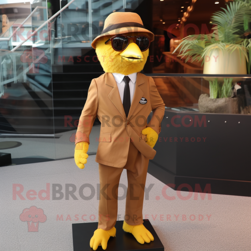 Brown Canary mascot costume character dressed with a Suit Pants and Sunglasses