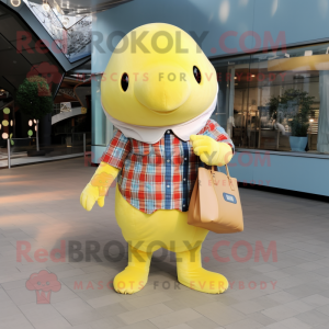 Lemon Yellow Whale mascot costume character dressed with a Flannel Shirt and Clutch bags