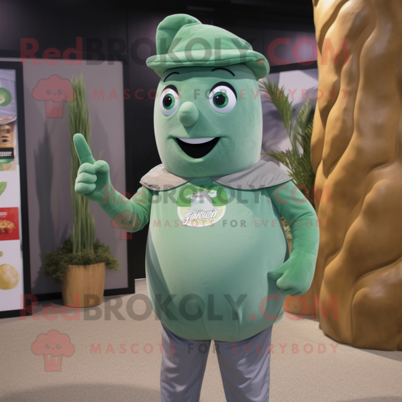 Gray Green Bean mascot costume character dressed with a T-Shirt and Cufflinks Gray Green Bean mascot costume character dressed with a T-Shirt and Cufflinks