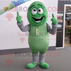 Gray Green Bean mascot costume character dressed with a T-Shirt and Cufflinks