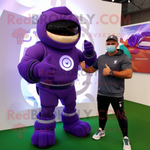 Purple Rugby Ball mascot costume character dressed with a Hoodie and Smartwatches