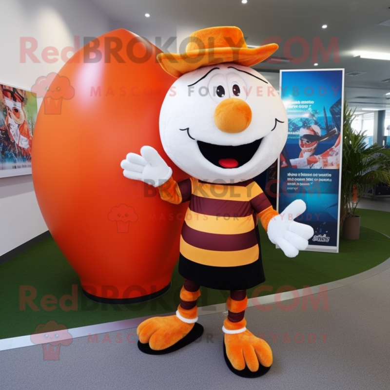 Orange Zebra mascot costume character dressed with a Rugby Shirt and Beanies