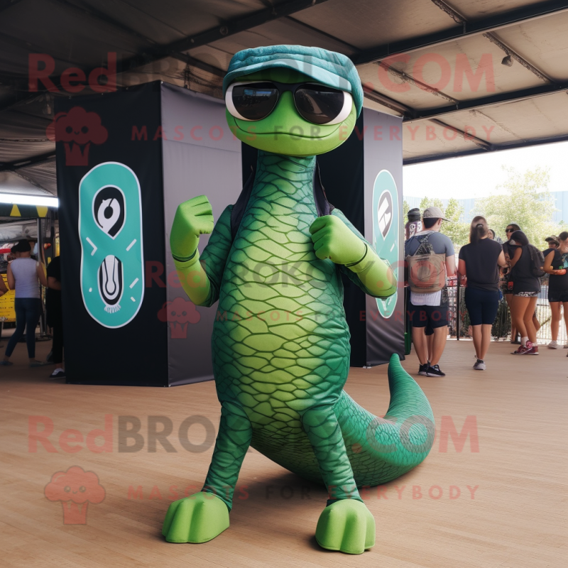 Forest Green Titanoboa mascot costume character dressed with a Skinny Jeans and Sunglasses Forest Green Titanoboa mascot costume character dressed with a Skinny Jeans and Sunglasses