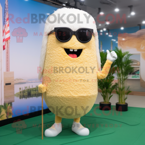 Beige Fried Rice mascot costume character dressed with a Shorts and Sunglasses