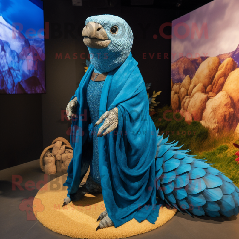 Blue Pangolin mascot costume character dressed with a Wrap Skirt and Shawls