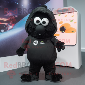 Black Potato mascot costume character dressed with a Hoodie and Suspenders