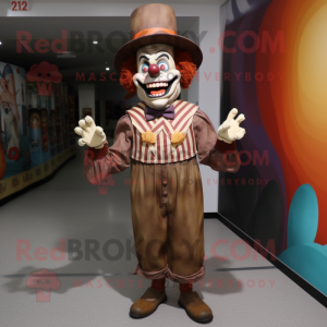 Brown Evil Clown mascot costume character dressed with a Skinny Jeans and Hats