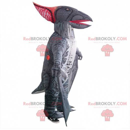 Mascota de dinosaurio inflable, gris, gigante e impresionante.