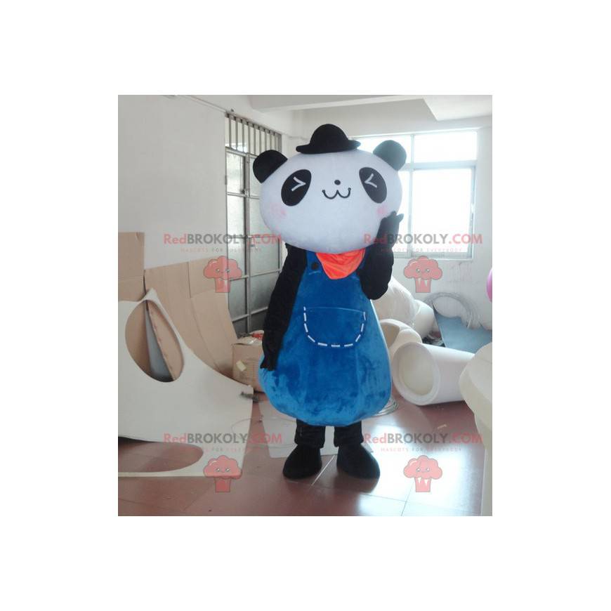 Czarno-biała maskotka panda w niebieskiej sukience -