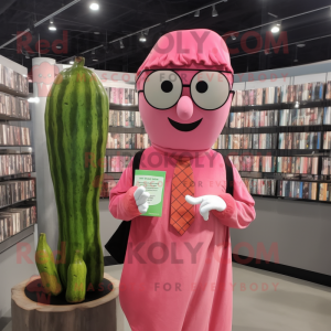 Pink Zucchini mascot costume character dressed with a Dress Shirt and Reading glasses