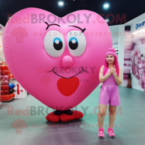 Pink Heart Shaped Balloons mascot costume character dressed with a Tank Top and Shoe laces