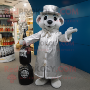 Silver Champagne mascot costume character dressed with a Coat and Handbags