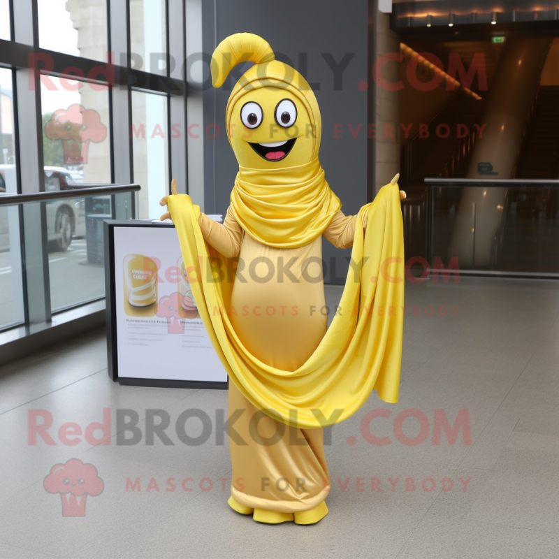 Gold Banana mascot costume character dressed with a Empire Waist Dress and Scarf clips