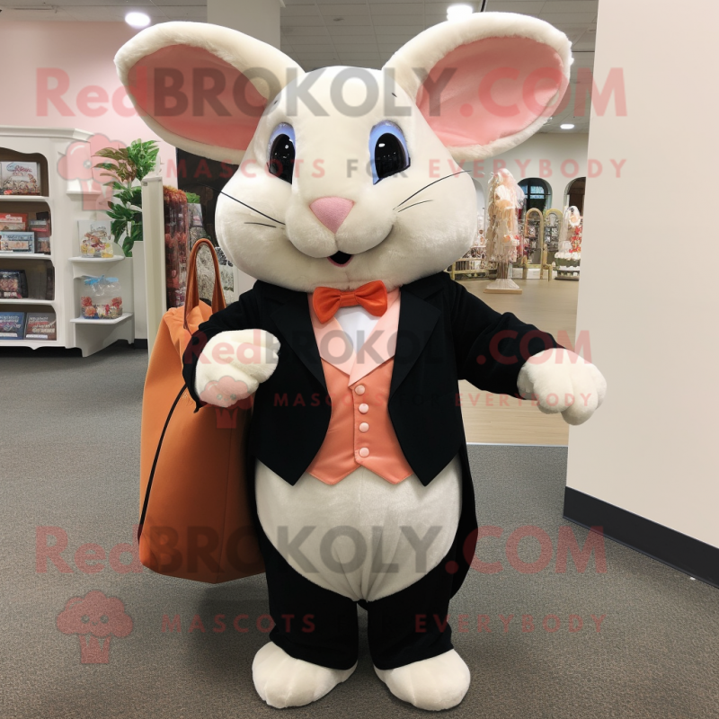 Peach Chinchilla mascot costume character dressed with a Tuxedo and Tote bags Peach Chinchilla mascot costume character dressed with a Tuxedo and Tote bags
