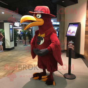 Maroon Toucan mascot costume character dressed with a Long Sleeve Tee and Hat pins