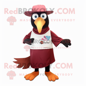 Maroon Toucan mascot costume character dressed with a Long Sleeve Tee and Hat pins