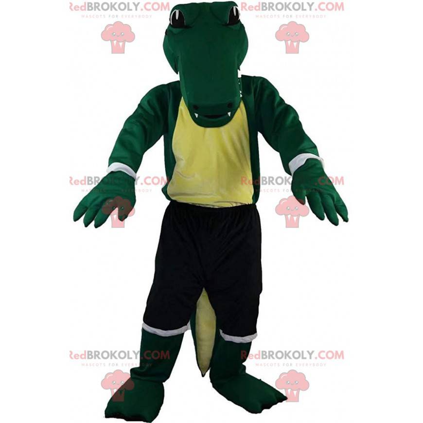 Mascote crocodilo verde em roupas esportivas, fantasia de