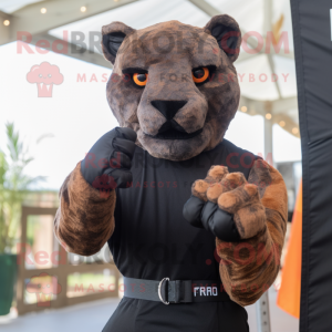 Rust Panther mascot costume character dressed with a Playsuit and Gloves