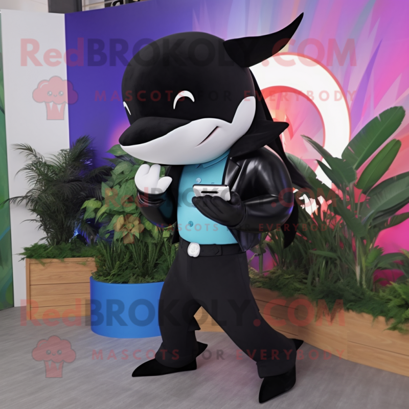 Black Killer Whale mascot costume character dressed with a Chinos and Digital watches Black Killer Whale mascot costume character dressed with a Chinos and Digital watches
