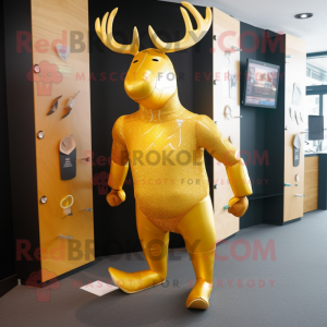 Gold Elk mascot costume character dressed with a Rash Guard and Foot pads