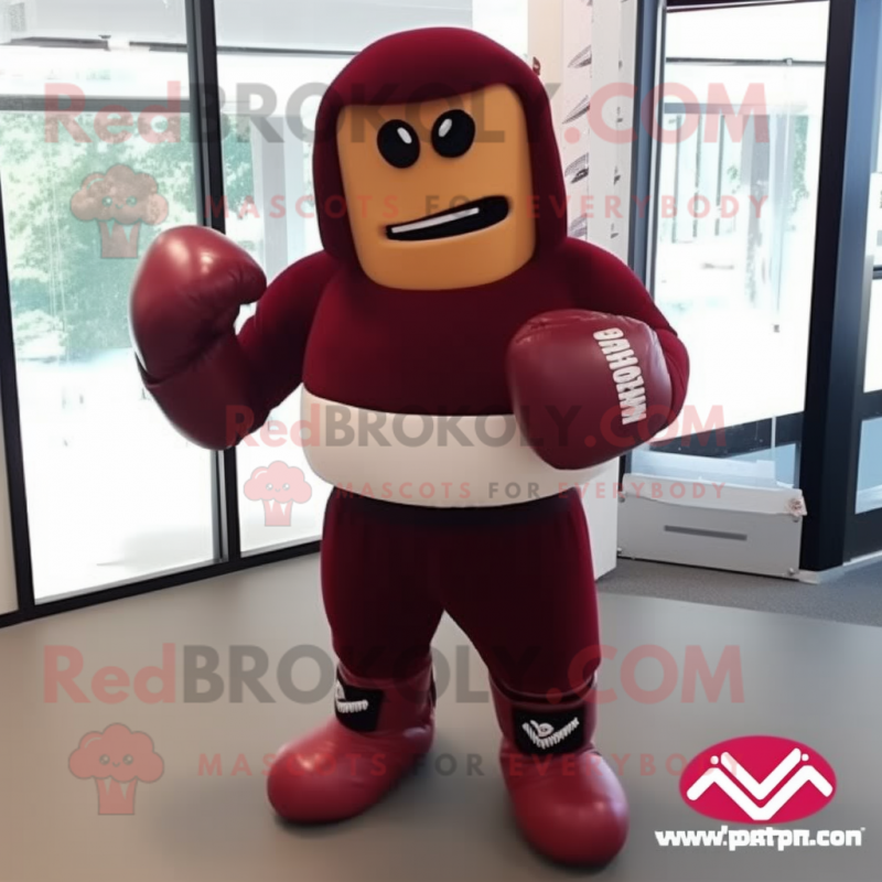 Maroon Boxing Glove mascot costume character dressed with a Rash Guard and Gloves