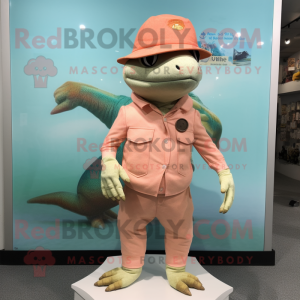 Peach Lizard mascot costume character dressed with a Bermuda Shorts and Berets
