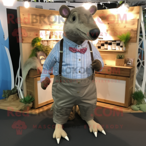 nan Armadillo mascot costume character dressed with a Oxford Shirt and Shoe clips