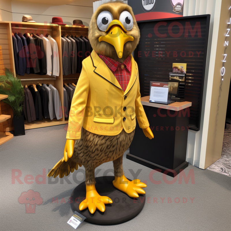 Gold Quail mascot costume character dressed with a Blazer and Shoe clips