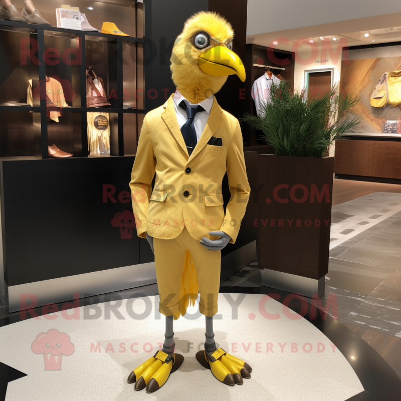 Gold Quail mascot costume character dressed with a Blazer and Shoe clips